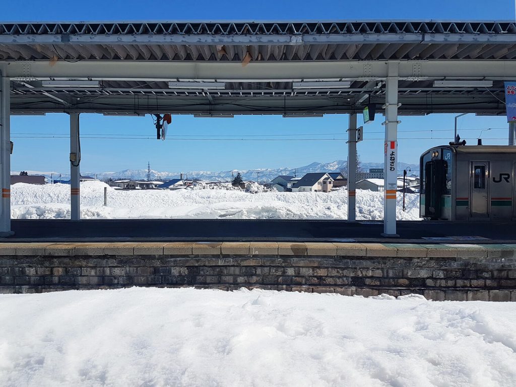 Yonezawa Station in the middle of a snowy landscape